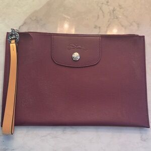 Longchamp Burgundy Clutch with Tan Wrist Strap